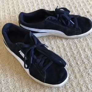 Puma sneakers black with white racing stripe. Hardly worn and in good condition